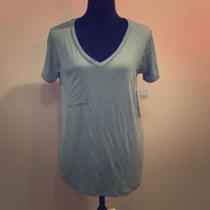 Sage green short sleeved shirt from Wantable